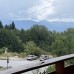 Просторен апартамент с една спалня и панорамна гледка към планината